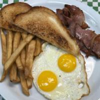 Breakfast Plate · 2 eggs, toasts, potatoes. ham or bacon.