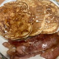 Pancakes · 3 Pancakes with your choice of bacon or Ham.