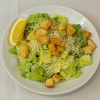 Caesar Salad · Romaine, Housemade Caesar dressing, parmesan, toasted croutons, and lemon
