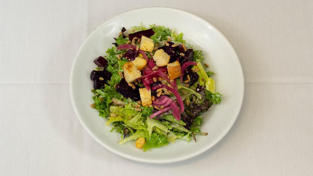 Clyde'S Og Salad · Mixed greens, beets, pickled onions, sunflower seeds, croutons, and Clyde's bleu cheese-horseradish dressing.