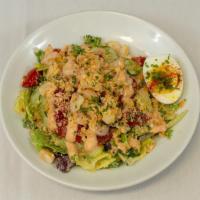 Little Louie Salad · Mixed greens, shrimp, hard boiled egg, tomatoes, Louie dressing, and brown-butter breadcrumbs.