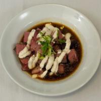 Prime Rib Bites · Tender bite-sized pieces of our slow-roasted prime rib. Served au jus and horsey sauce.

*Co...