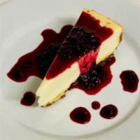 New York Cheesecake · Traditional New York style with a berry compote
