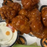 Boneless Wings · Crispy breaded chunks of all white meat chicken. Order yours naked, with sauce on the side o...