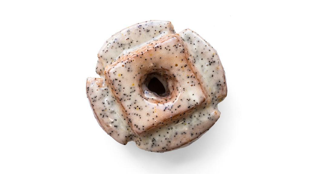 Lemon Poppy Buttermilk Old-Fashioned · Lemon Poppy is BACK as a seasonal donut!!!

Our creamy buttermilk old-fashioned cake donut is lightly glazed with this bright, tartly sweet topping, made with fresh lemon juice and lemon zest. A light dusting of poppy seeds provides a bit of smoky texture balance.
