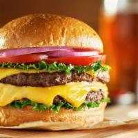 Double Cheese Burger · Delicious Burger made with 2 beef patties, melted cheese, lettuce, tomatoes, and onion. Serv...