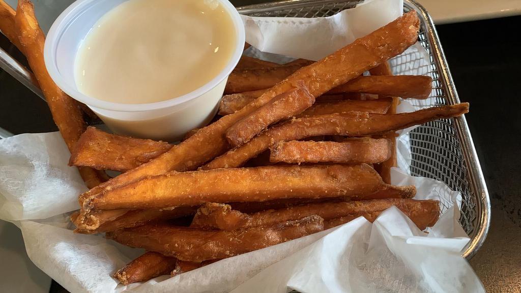 Sweet Potato Fries, Maple Cream · Sweet potatoes fries cooked by order, serve with Maple Cream Sauce.