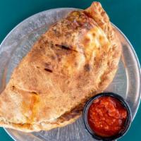 Specialty Calzone · All calzones are filled with mozzarella and ricotta and served with a side of marinara. Sele...