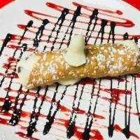 Lunch Cannoli · Cinnamon flaky crust filled with chocolate chips and sweet ricotta