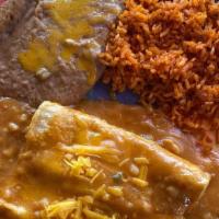 Cheese Enchiladas · Three fried corn tortillas stuffed with Mexican cheese and smothered with our secret enchila...