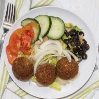 Falafel Salad · Falafel, romaine lettuce, tomatoes, cucumbers, red onions, olives, and house dressing.