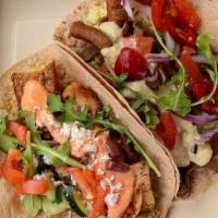 2 Mediterranean Tacos · (cheaper delivery prices at eatgrkitchen.com)