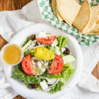 Small Greek Salad · Romaine lettuce, tomatoes, cucumbers, Feta cheese, olives, onions and peppercinis with house...