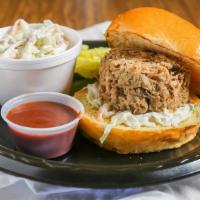 Pulled Pork Sandwich · Our specially seasoned in house pork-butt, pulled to perfection by hand. Piled high on top a...