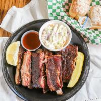1/2 Slab Pork Ribs · St.louis style pork ribs, hickory smoked and seasoned with our signature dry rub. Smothered ...