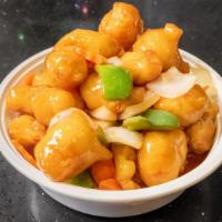 Sweet & Sour Chicken · Battered and deep fried with bell pepper pineapple onions, carrots, and sweet and sour sauce...