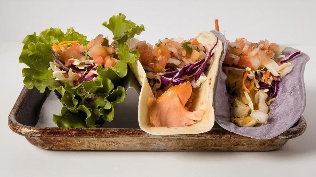 Taco Mix (3) · Choice Flour Tortilla Or Lettuce Shell, Choice 3 Protein Mix or Match, Steak, Chicken, Carnitas, Portobello, Smoked Salmon.  Topped With Mexican Cheese, Cabbage Blend, And Pico.
