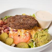 Burger Salad · Romaine, Cabbage Blend, Hamburger, Diced Bacon, Mexican Blend Chz, Guacamole, Tomato, Red On...