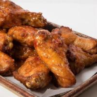 10 Wings New · 10 Bone In Wings Choice of Traditional Buffalo Sauce, Honey BBQ Sauce, or Garlic & Jalapeno ...