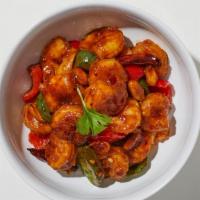 Kung Pao Shrimp · Shrimp sautéed with chili pepper, zucchini, white onions, carrots and roasted peanuts in our...