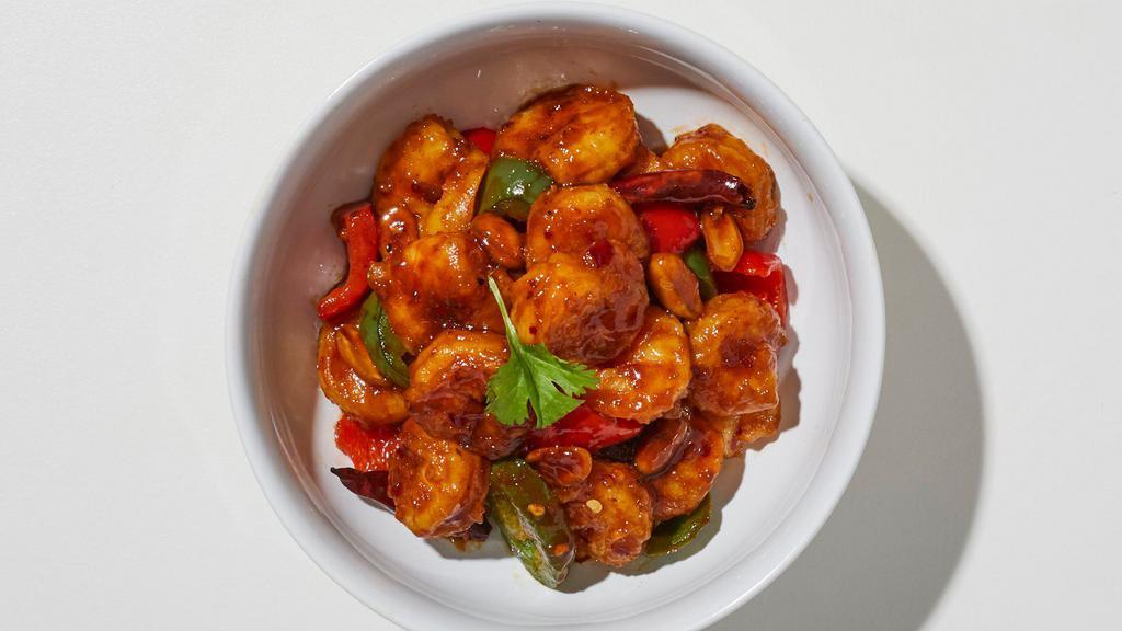 Kung Pao Shrimp · Shrimp sautéed with chili pepper, zucchini, white onions, carrots and roasted peanuts in our Chef’s Chili Seared Soy Sauce. Served with Steamed White Rice