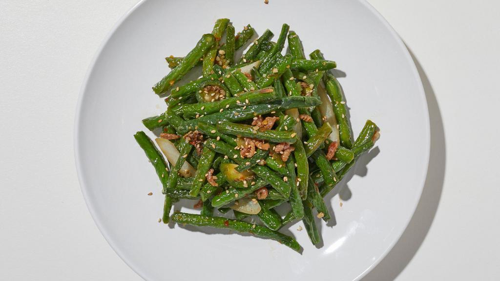 Chinese String Beans · Spicy chili sautéed with string beans in a chili garlic brown sauce….