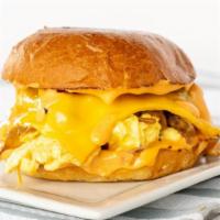Walk Of Shame · #1 seller, local cage free soft scrambled eggs topped with caramelized onions, american chee...