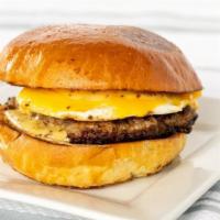 Sausage, Egg & Cheese · pork sausage, local cage free runny egg american cheese and honey mustard aioli served in a ...