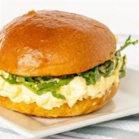 Speak Of The Devil · chilled cage free hard cooked eggs, mixed in mayo and topped with wasabi sauce, dressed orga...