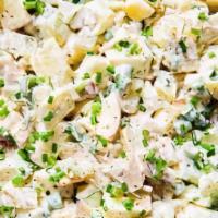 Russian Potato Salad · Potatoes, green peas, carrots, pickles, hard boiled eggs, mayo and chicken.