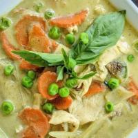 Green Curry · Thai eggplant, green pea, bell pepper, bamboo shoot, sweet basil leaf, and carrot in coconut...