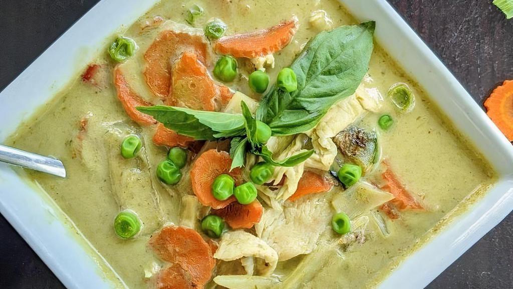 Green Curry · Thai eggplant, green pea, bell pepper, bamboo shoot, sweet basil leaf, and carrot in coconut green curry