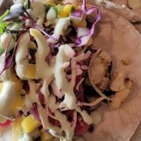 Grilled Fish Tacos (2) · Spice-rubbed and sauteed Alaskan cod with cabbage, pickled red onion, pico de gallo, avocado...