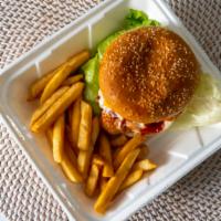 Burger Combo · Burger and fries.
Cheese, lettuce, tomatoes, onions, Ketchup, and Mayo