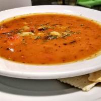 Minestrone Soup · Tomato based broth with beans, pasta, and vegetables.