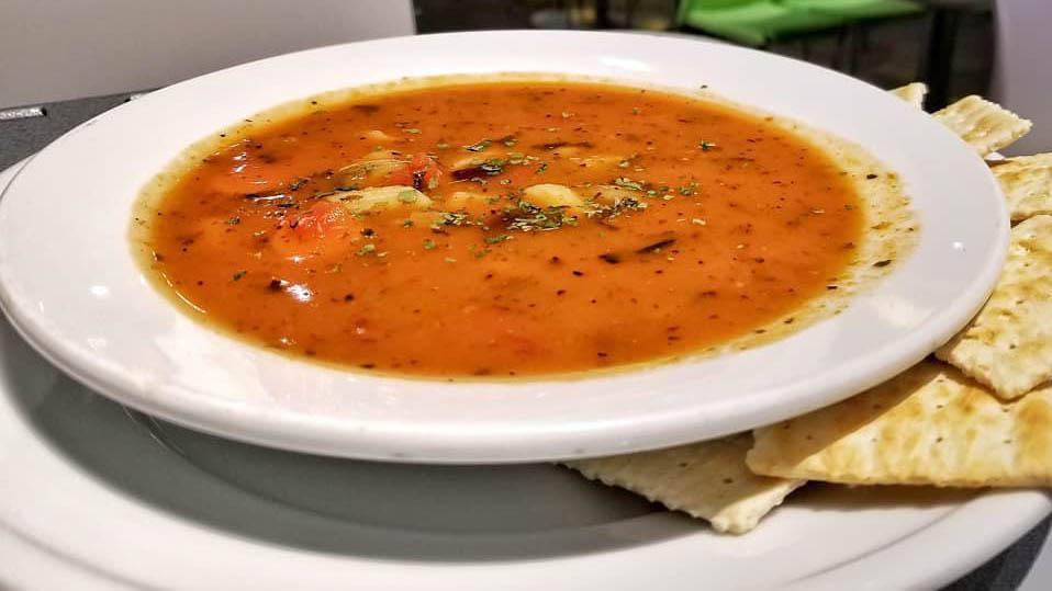 Minestrone Soup · Tomato based broth with beans, pasta, and vegetables.