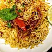 Chicken Biryani. · Aromatic Dum Rice cooked on low heat with flavorful spices and delicious chicken.  Which is ...