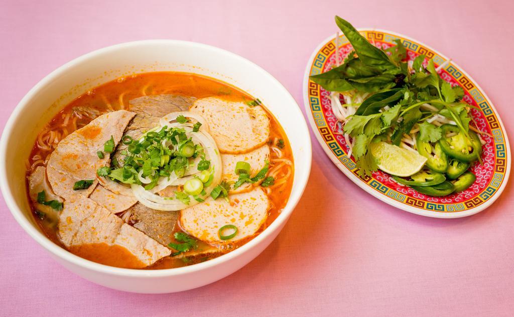  Spicy Beef Broth · Rice Vermicelli in spicy beef broth with fried pork loaf and spicy sliced beef