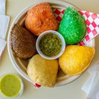 12 Empanadas · Delicious, veggie or meat filled fried pastries. Mix and match flavors!