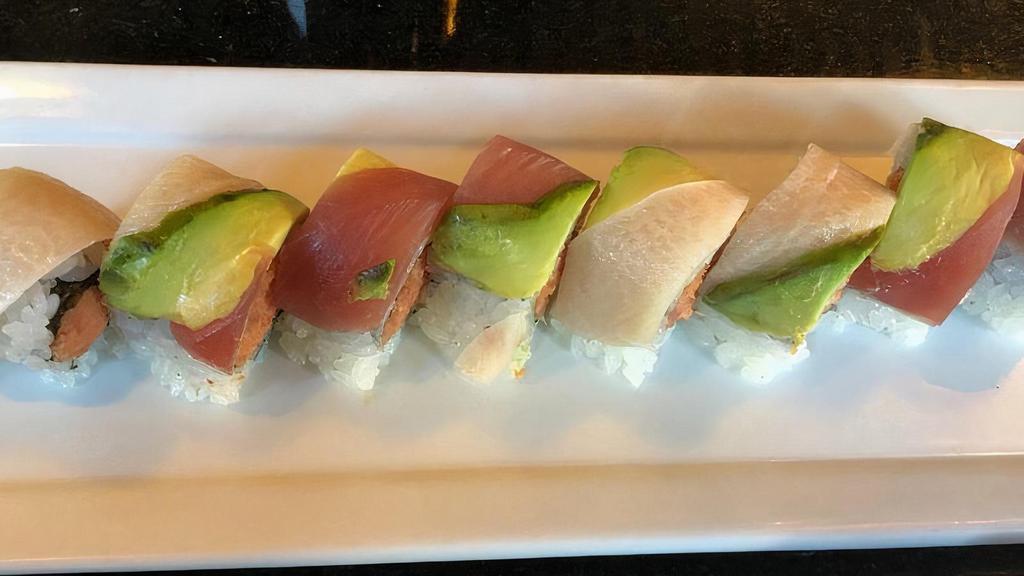 Tokyo Roll · Raw. 8pieces. Spicy tuna and tempura crunch inside, with tuna, yellowtail and avocado outside.