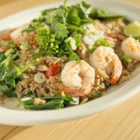 Fried Rice · Stir-fried rice with chinese broccoli, onion, tomato, egg, and our house special sauce.