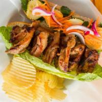 Grilled Chicken Sandwich · Pickled cucumber and carrot, red onion, cilantro, romaine lettuce, and mayo. Served on dutch...