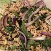 Larb · Your choice of finely chopped chicken or beef lightly sauteed and then tossed with fresh lem...