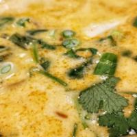 Tom Kha Vegetable Soup · A creamy and delightful coconut milk version of the Thai hot and sour broth with lemongrass,...