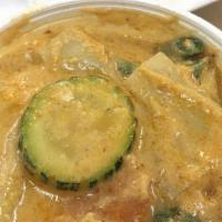 Panang Curry · A mix of panang curry paste and coconut milk  with green bean, carrot and zucchini.