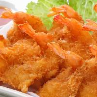 Tôm Chiên Bột · Deep-fried shrimp - Tiger Prawns fried in coconut flakes tossed with 
panto breadcrumbs, ser...