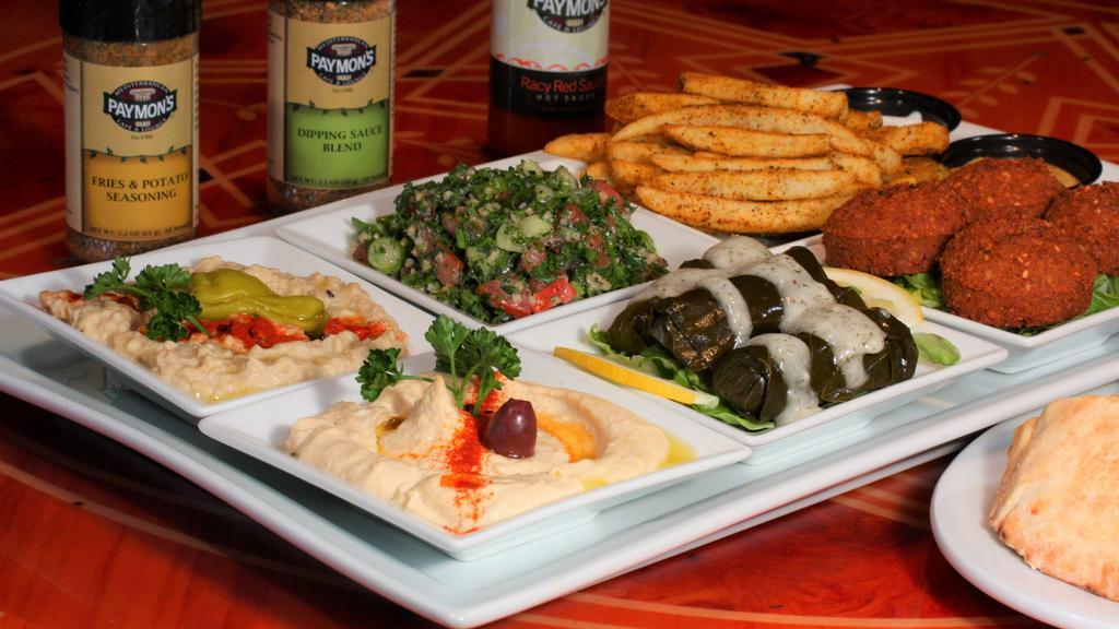 Combination Platter · Vegetarian, vegan without dipping sauces. Enjoy a variety of delicious vegetarian treats from the Mediterranean. Hummus, Jalapeno-Lime hummus, stuffed grape leaves, falafel, Baba ganoush, and Athens fries.