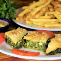 Spinach Pie - Spanakopita · Vegetarian. A delicious fillo dough pie made with spinach, onions, and imported feta cheese.