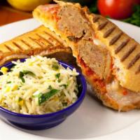 Meatball Parmesan Panini · A delicious layer of our seasoned meatballs, topped with marinara sauce, provolone cheese, a...
