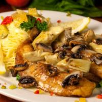 Tilapia Florentine · Seasoned tilapia filet sautéed with artichoke hearts and mushrooms. Served with angel hair p...